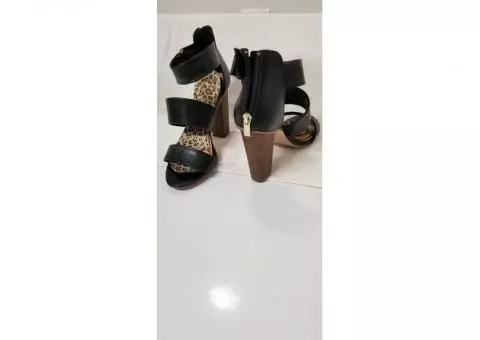 Black strappy sandals with 4" heels
